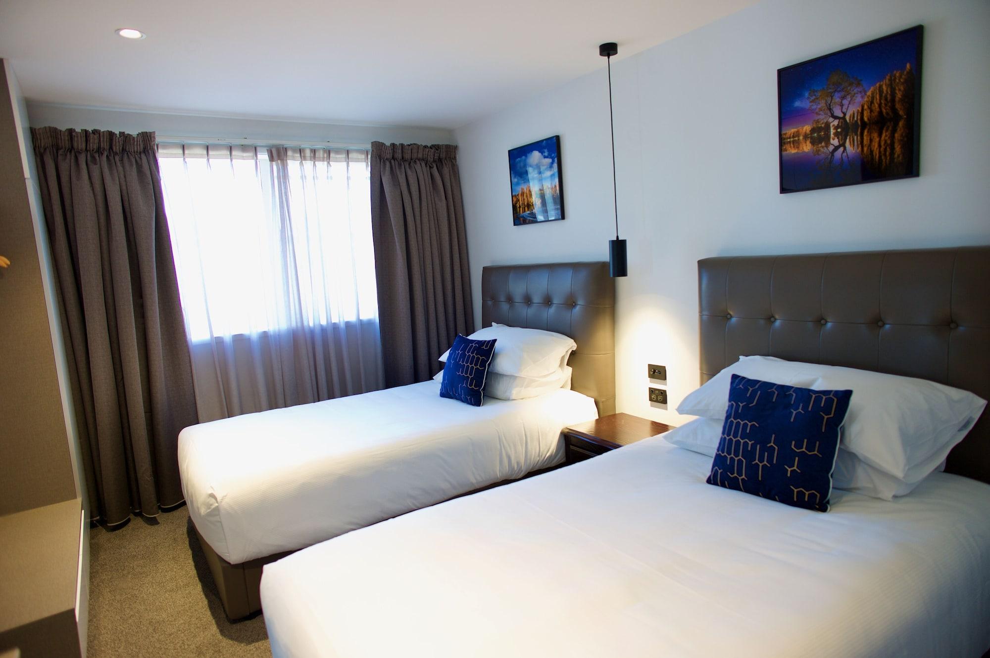 منتجع ريجال بالمز 5 ستار سيتي روتوروا المظهر الخارجي الصورة A typical bedroom at the hotel